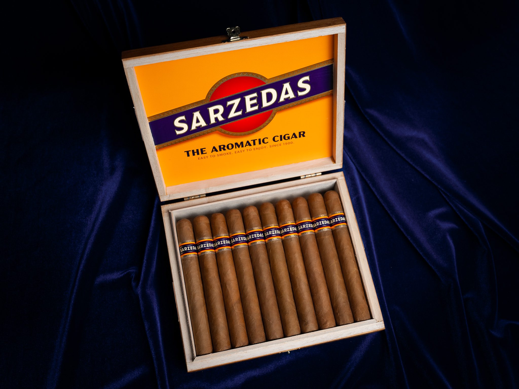 Sarzedas Toro Cigars Open Box with 10 visible cigars on a blue velvet backdrop